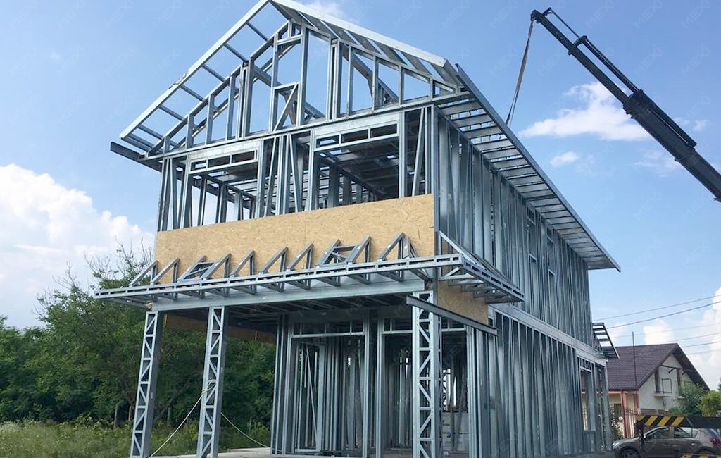 two storey house raised on light metal structure