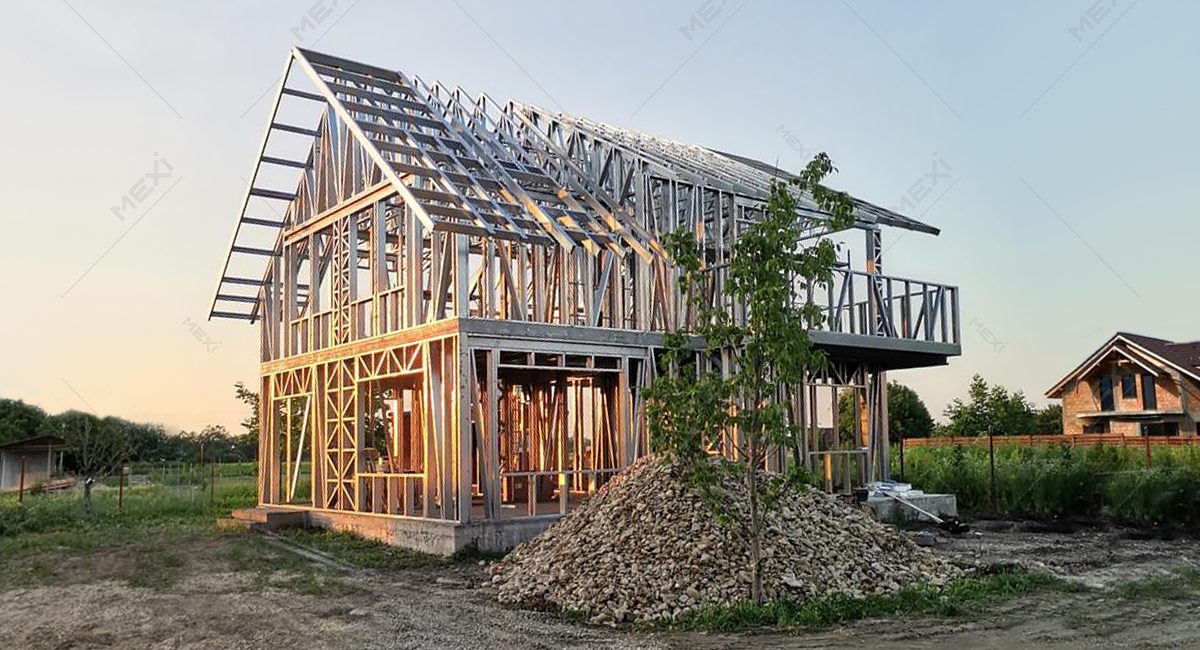 home with attic construction with preassembled frames
